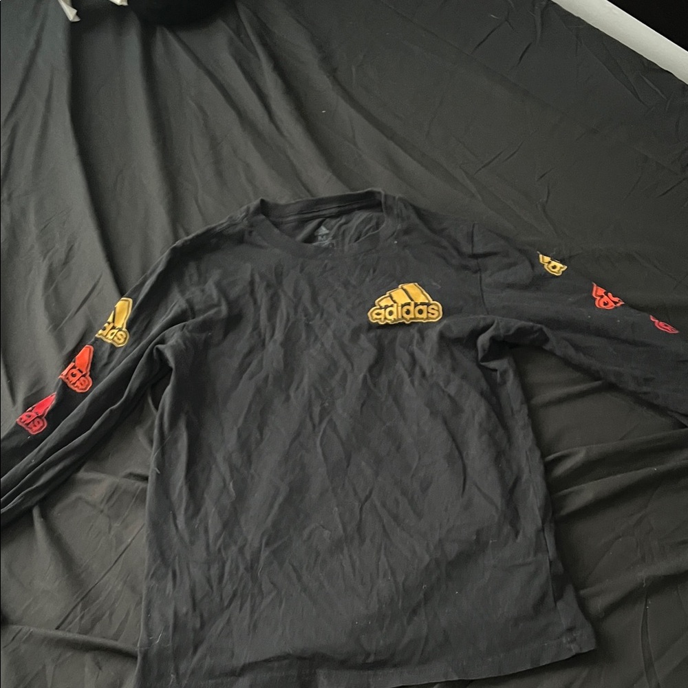 Adidas Black Long Sleeve Tee with Gold and Red Accents